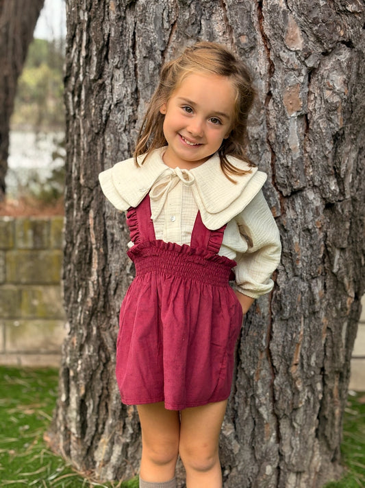 Faldita con tirantes granate